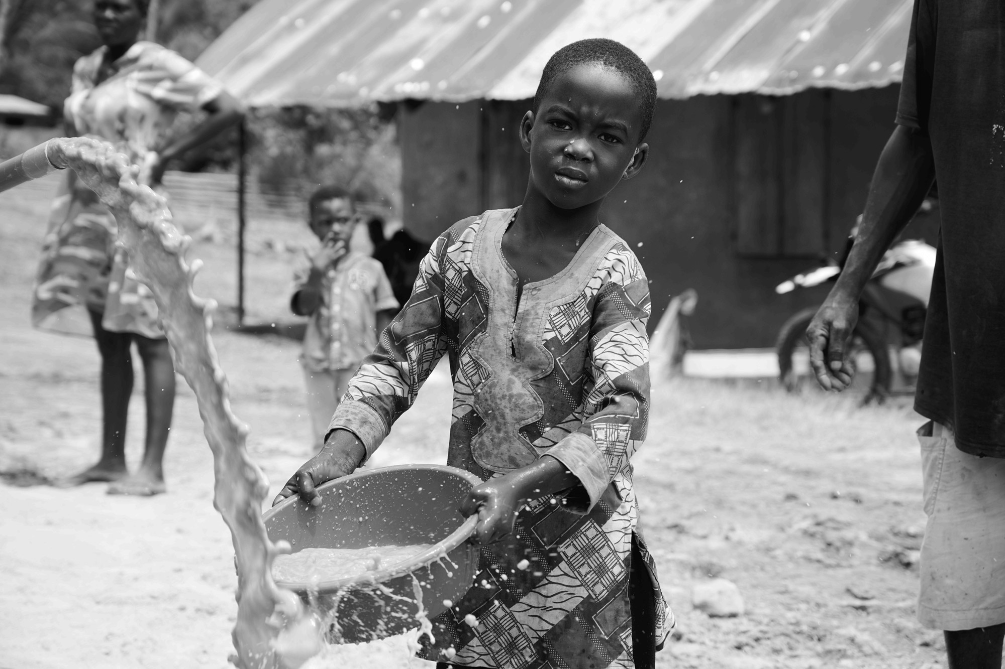 Every drop of water is precious. Here Community Action Ghana drilled through 100m of rock. The first water was full of dust; it now runs clear.